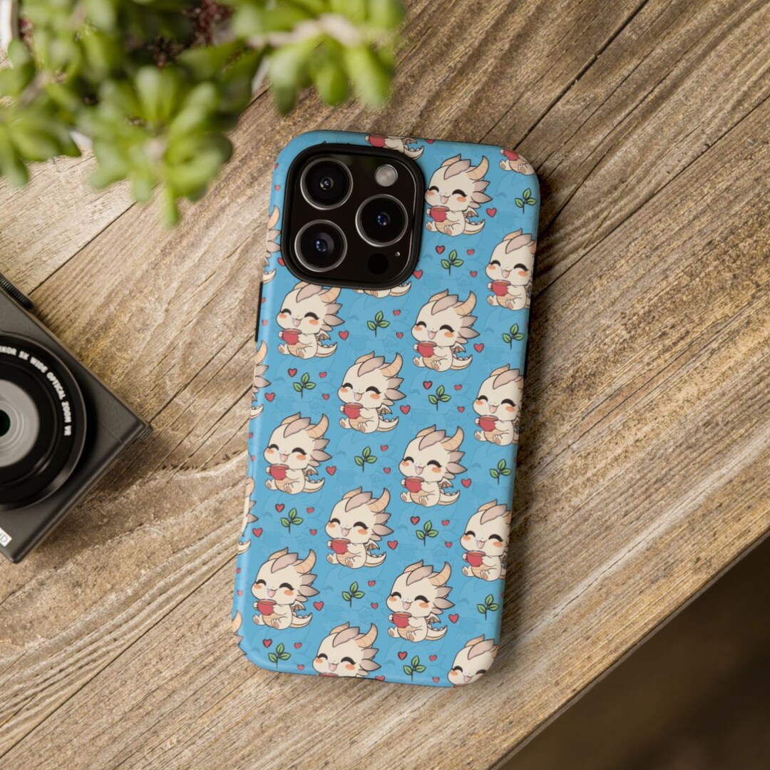Happy Dragon Drinking Tea Phone Case | Cute Chibi Dragon with Mug | Cozy Fantasy Creature Art | Tough Cases for Unique Style | MakerPlace by Michaels Happy Dragon Drinking Tea Phone Case | Cute Chibi Dragon with Mug | Cozy Fantasy Creature Art | Tough Cases for Unique Style | MakerPlace by Michaels